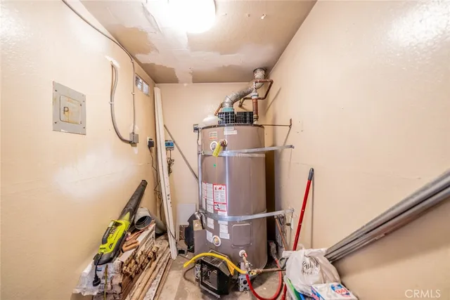 a bed room with furniture and a wooden floor