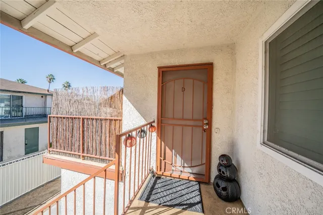 a bathroom with a sink toilet vanity and shower