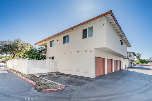 a view of a house with a street
