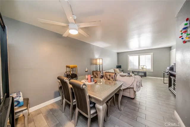 a view of a house with backyard sitting area