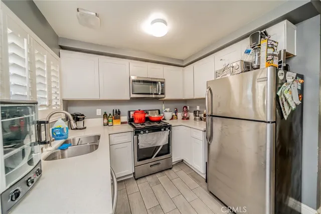 a bedroom with a bed and furniture