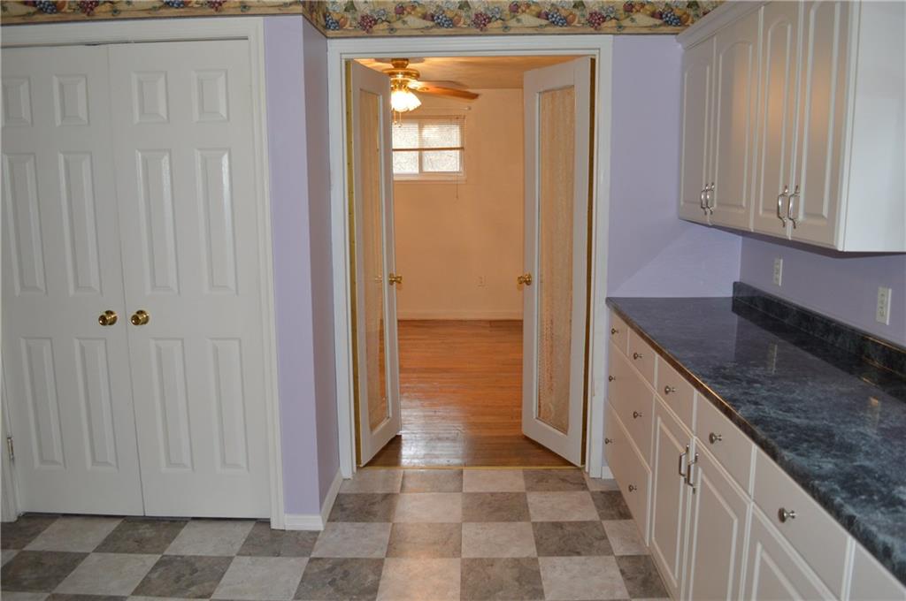 9080 Highland Road Pittsburgh, PA 15237 - Photo 4 of 25 Kitchen counter, pantry & double doors into dining room