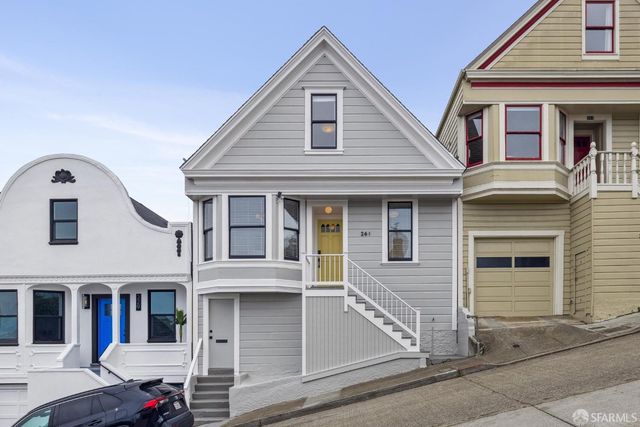 a front view of a building with street view