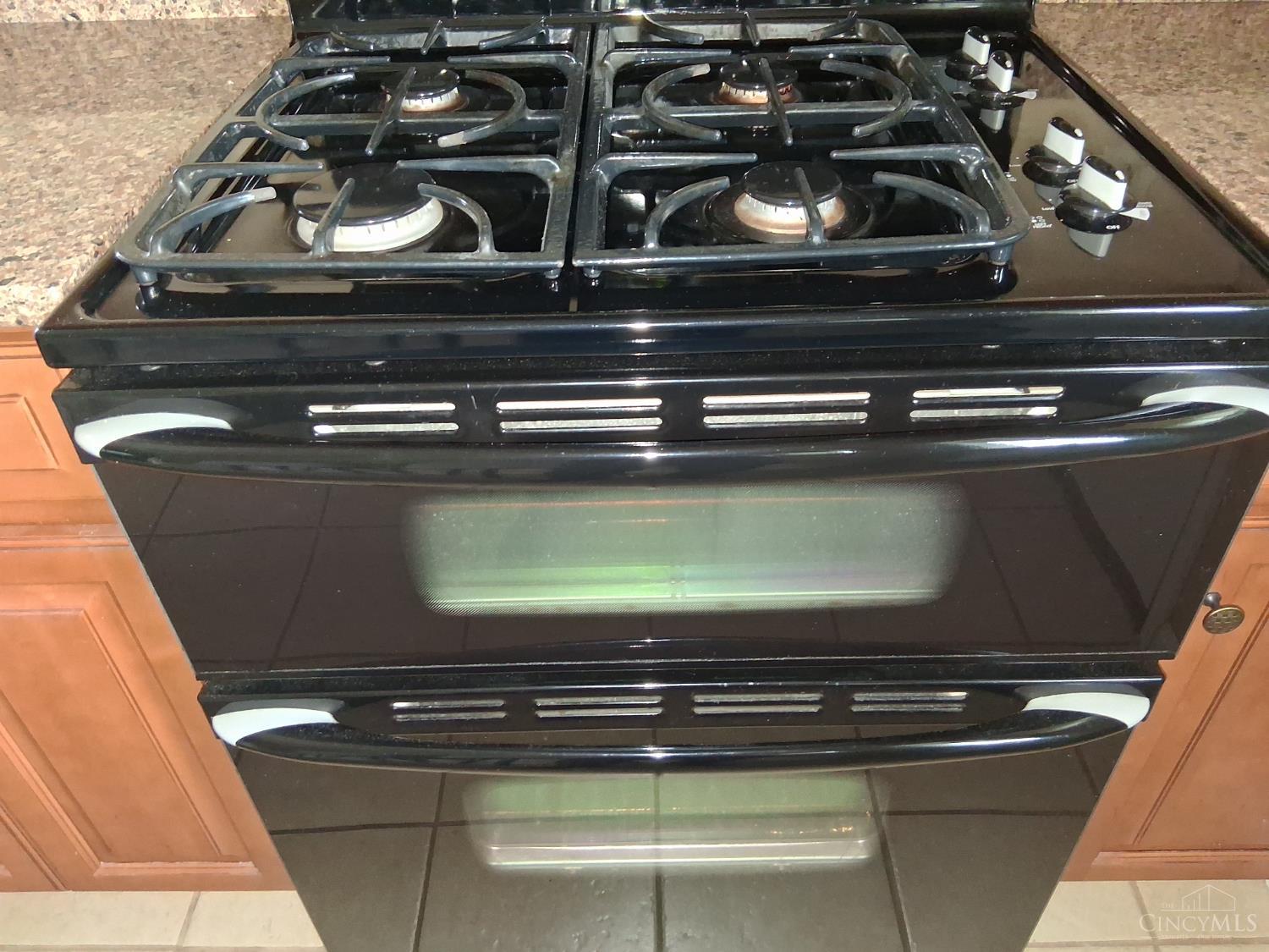 5949 Lawrence Road Cincinnati, OH 45248 - Photo 27 of 72 Gas stove with a double oven.