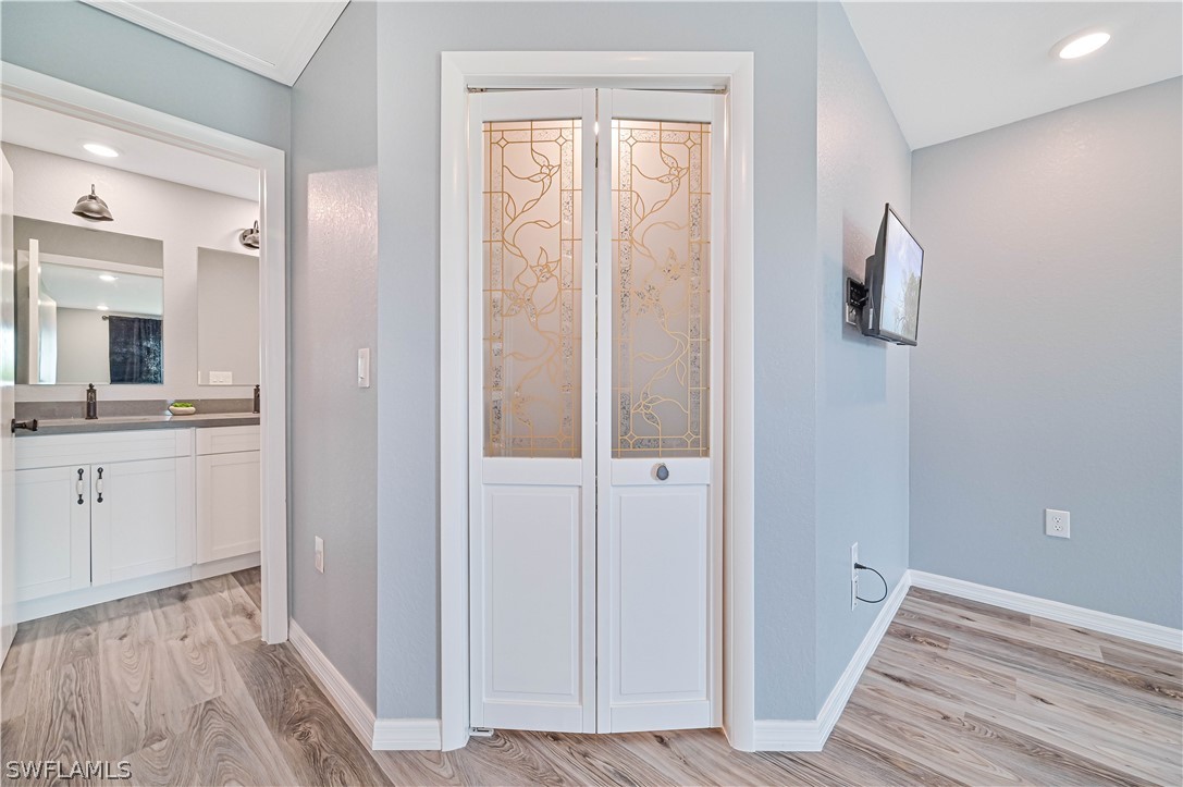 7085 Brazil Circle LaBelle, FL 33935 - Photo 23 of 32 a view of bathroom with a sink mirror and window
