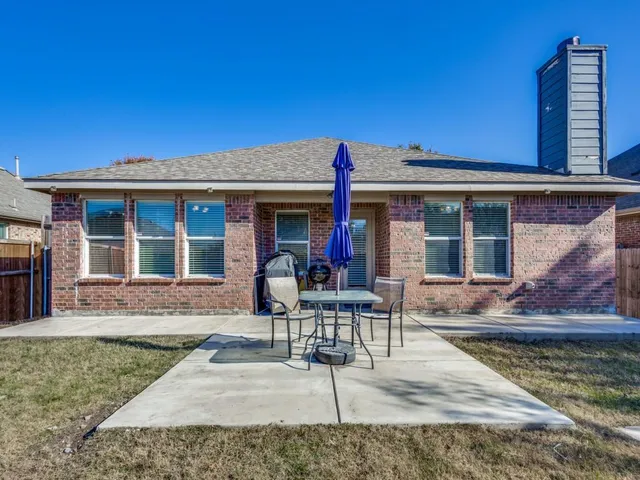 a view of a house with patio
