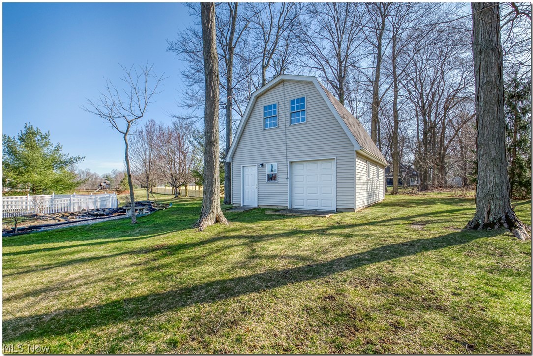 8451 Rockefeller Lane Northfield, OH 44067 - Photo 30 of 35 The deep wooded lot is just under an acre.