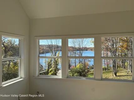 a view of a lake from a balcony