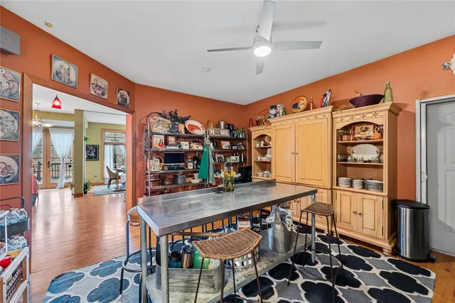 a kitchen with stainless steel appliances granite countertop a stove and a refrigerator