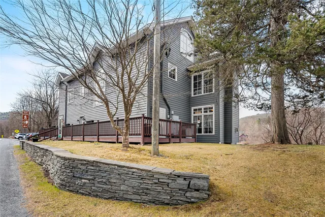 a view of a house with snow on the wall