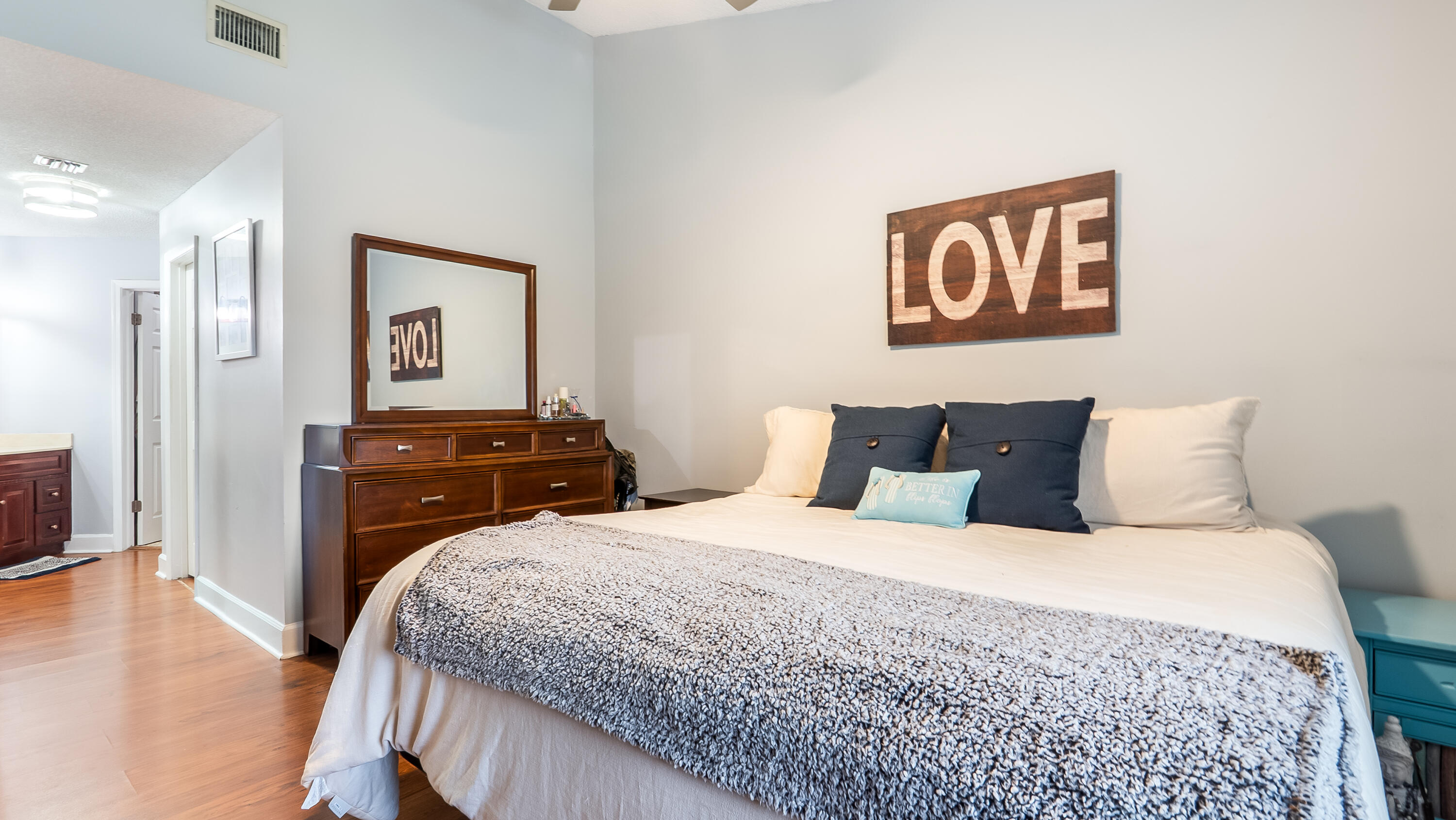 9358 Ketay Circle Boca Raton, FL 33428 - Photo 13 of 28 a bedroom with a bed and a flat screen tv