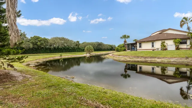 a view of a lake with a house