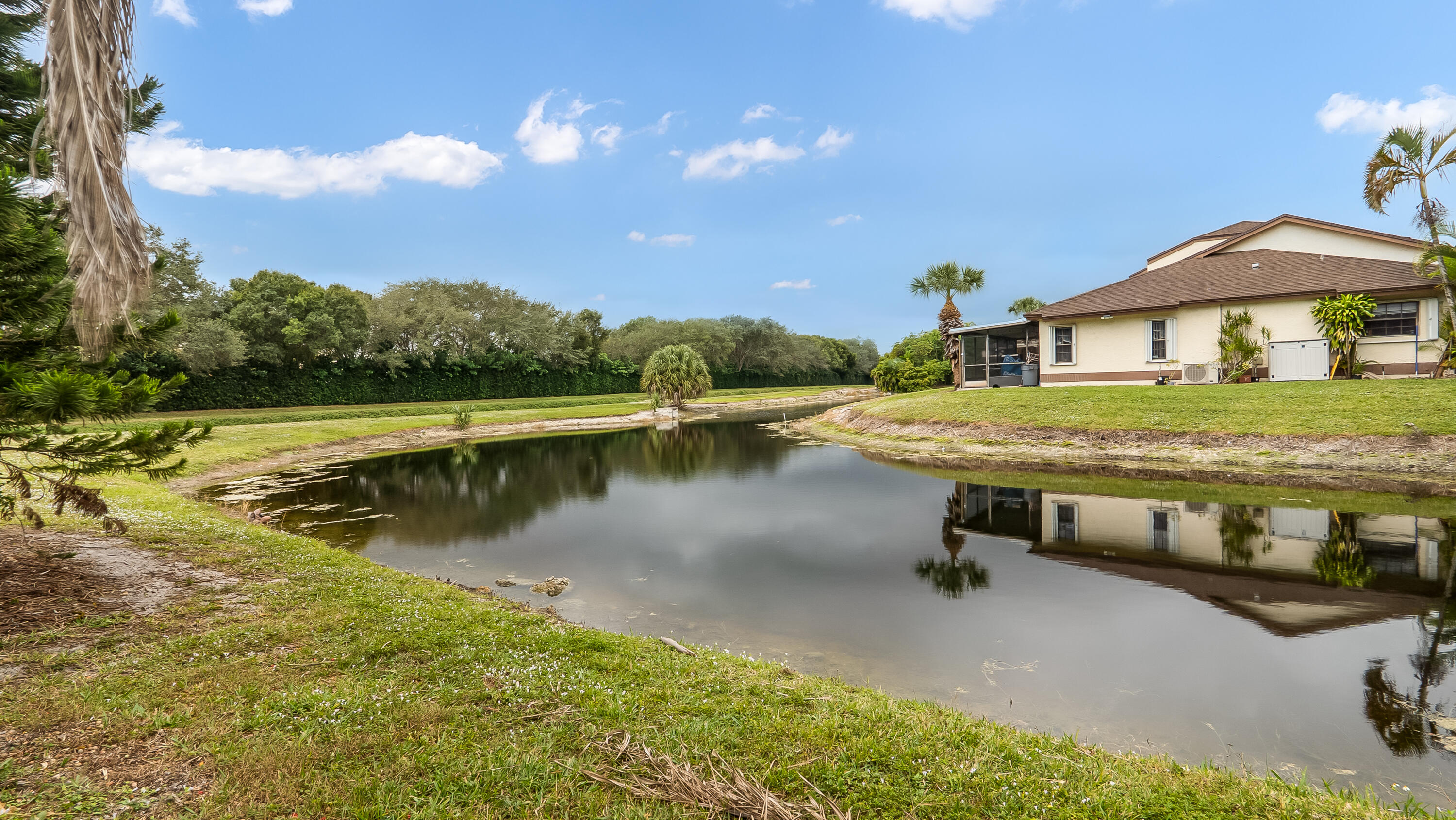 9358 Ketay Circle Boca Raton, FL 33428 - Photo 24 of 28 a view of a lake in front of house