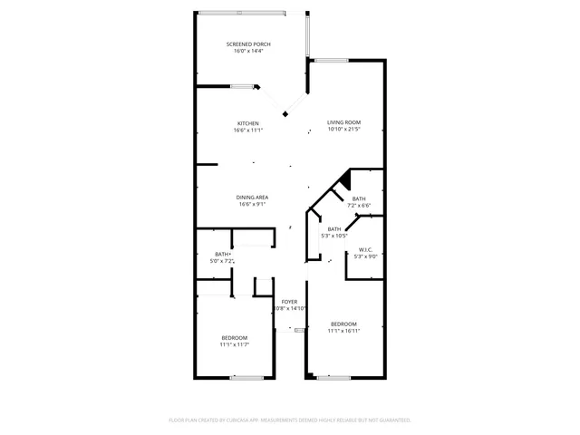 an aerial view of a house with garden space and lake view