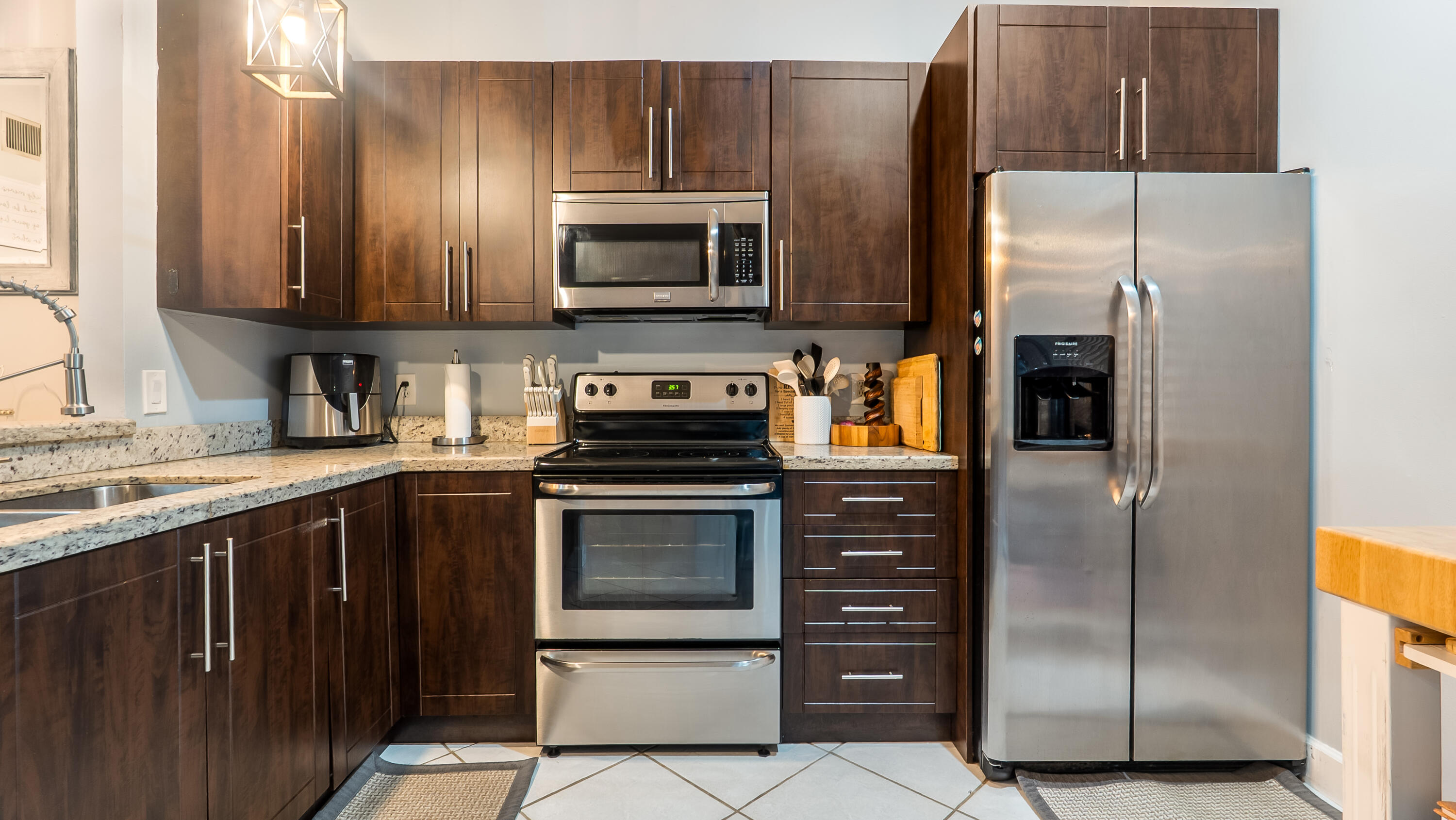 9358 Ketay Circle Boca Raton, FL 33428 - Photo 4 of 28 a kitchen with a refrigerator sink and microwave