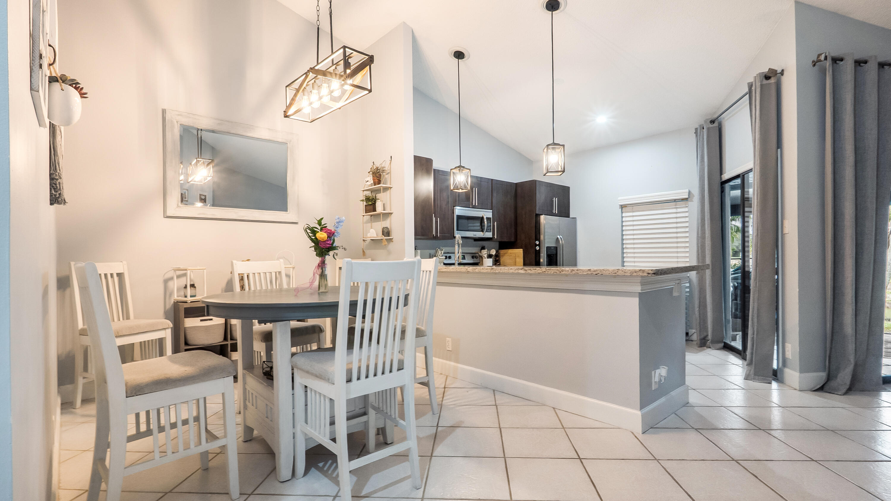 9358 Ketay Circle Boca Raton, FL 33428 - Photo 8 of 28 a view of kitchen with furniture and wooden floor
