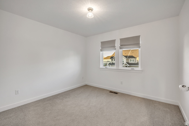 1058 Lilac Way Mapleton, UT 84664 - Photo 19 of 28 bedroom featuring baseboards and light carpet