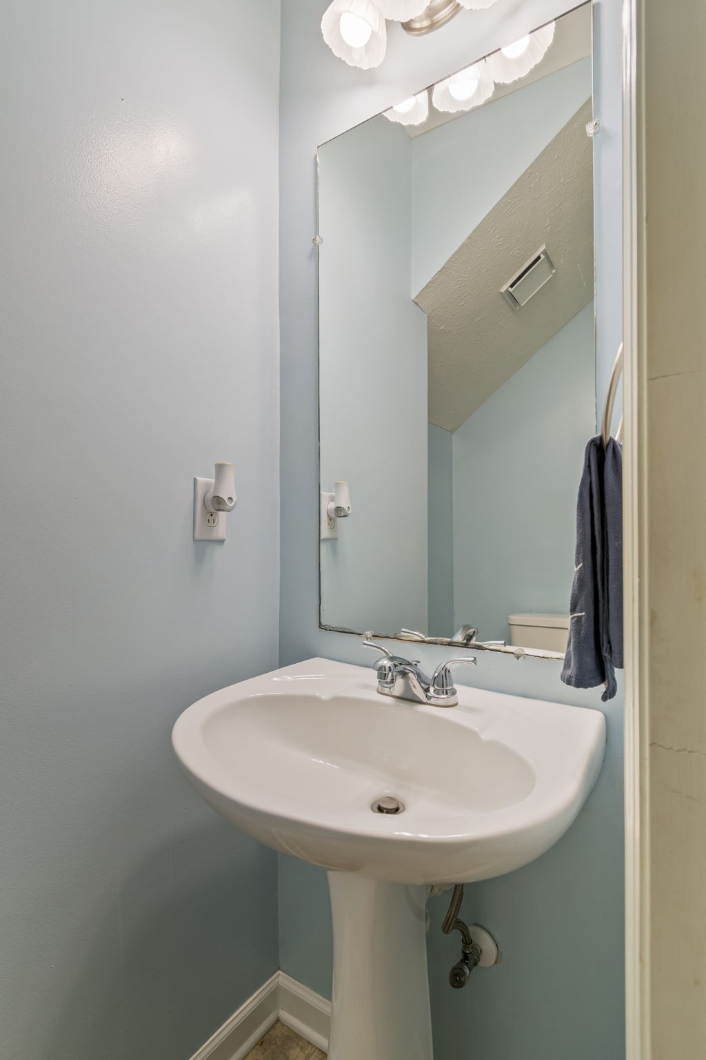 3317 Cornerstone Drive Murfreesboro, TN 37128 - Photo 17 of 33 a bathroom with a sink and a mirror