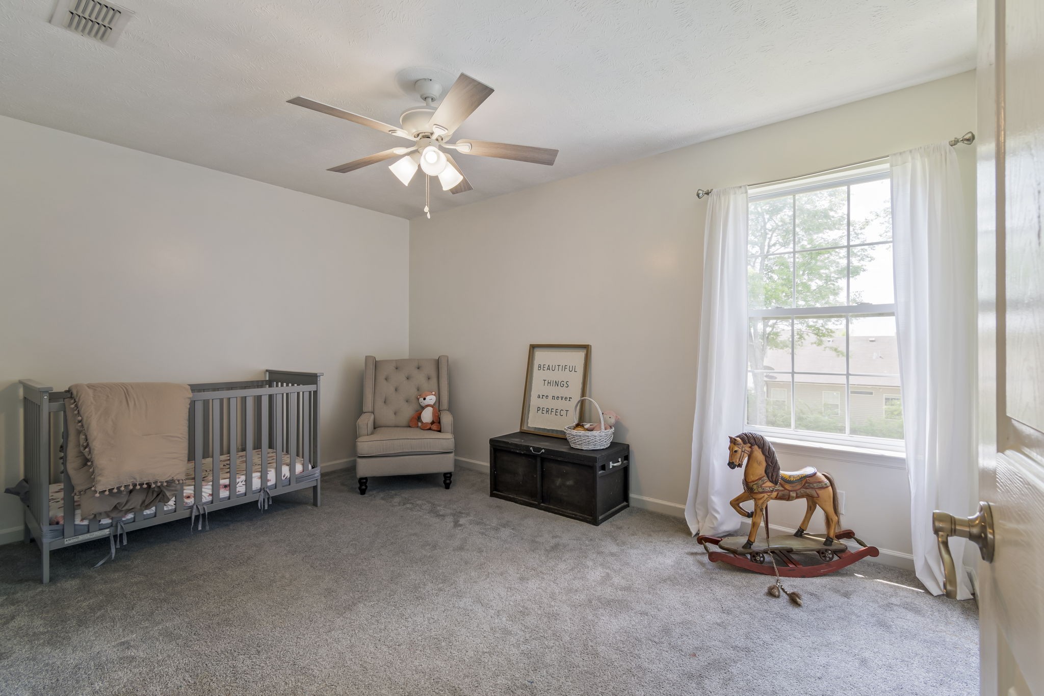 3317 Cornerstone Drive Murfreesboro, TN 37128 - Photo 27 of 33 a living room with furniture and a window
