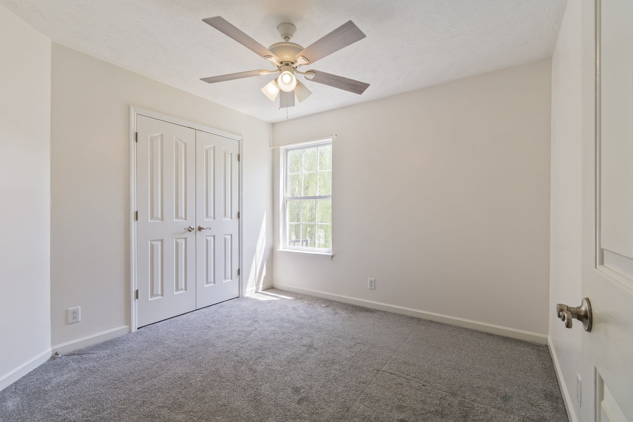 3317 Cornerstone Drive Murfreesboro, TN 37128 - Photo 28 of 33 an empty room with chandelier fan