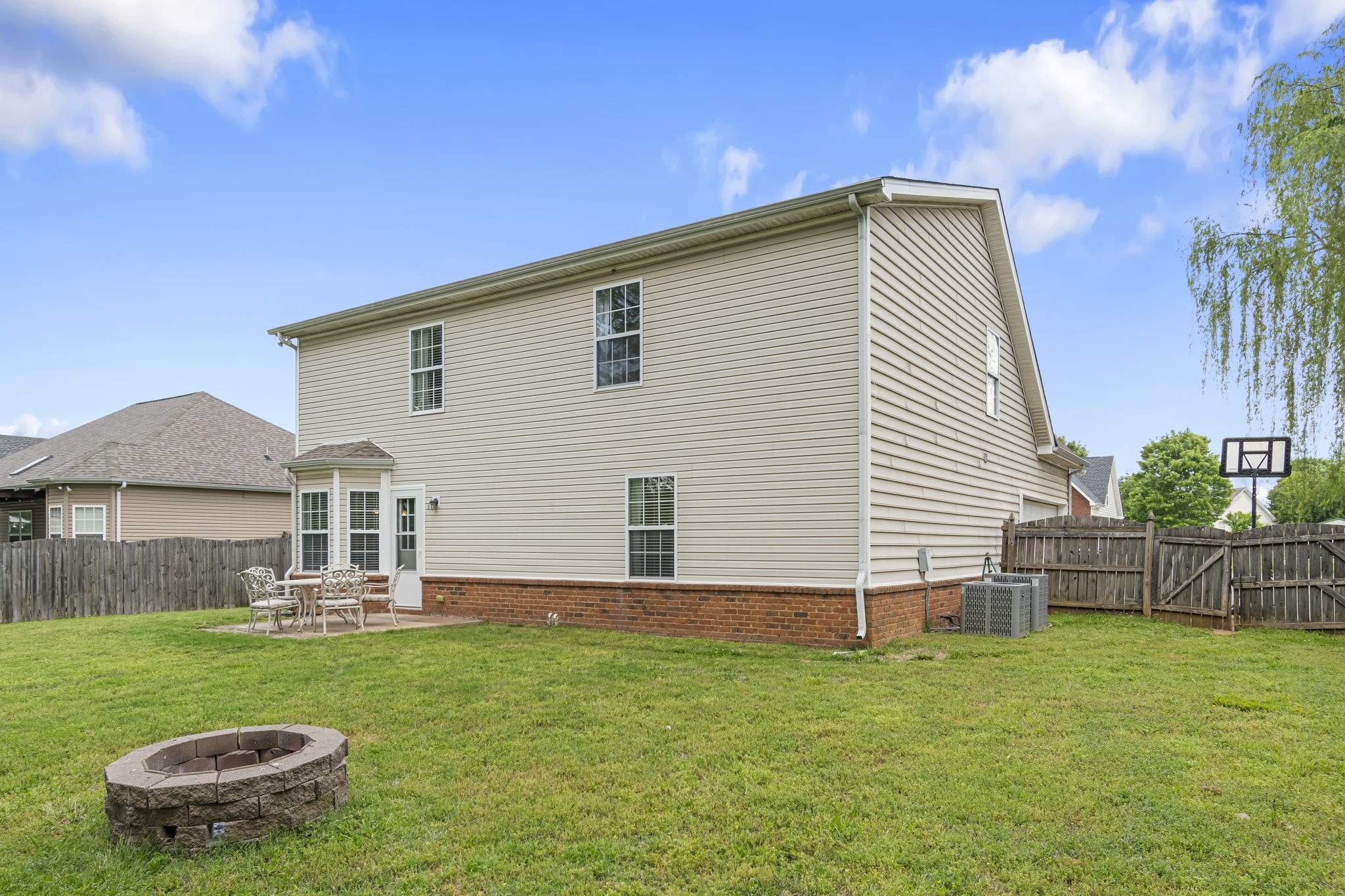 3317 Cornerstone Drive Murfreesboro, TN 37128 - Photo 31 of 33 a view of a house with a backyard