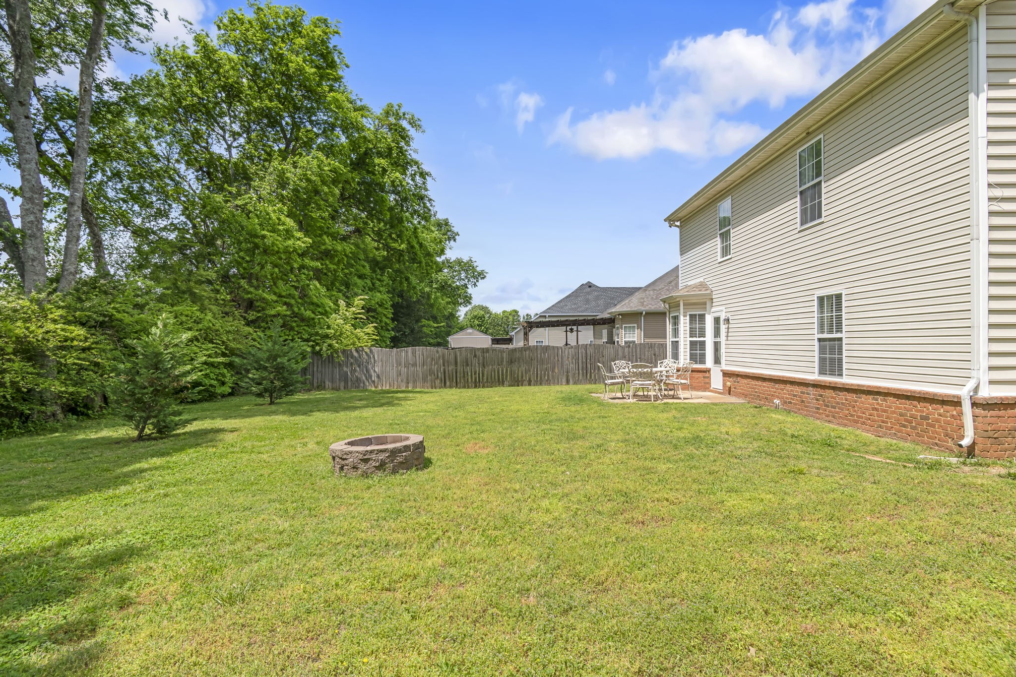 3317 Cornerstone Drive Murfreesboro, TN 37128 - Photo 32 of 33 a view of a swimming pool with a yard