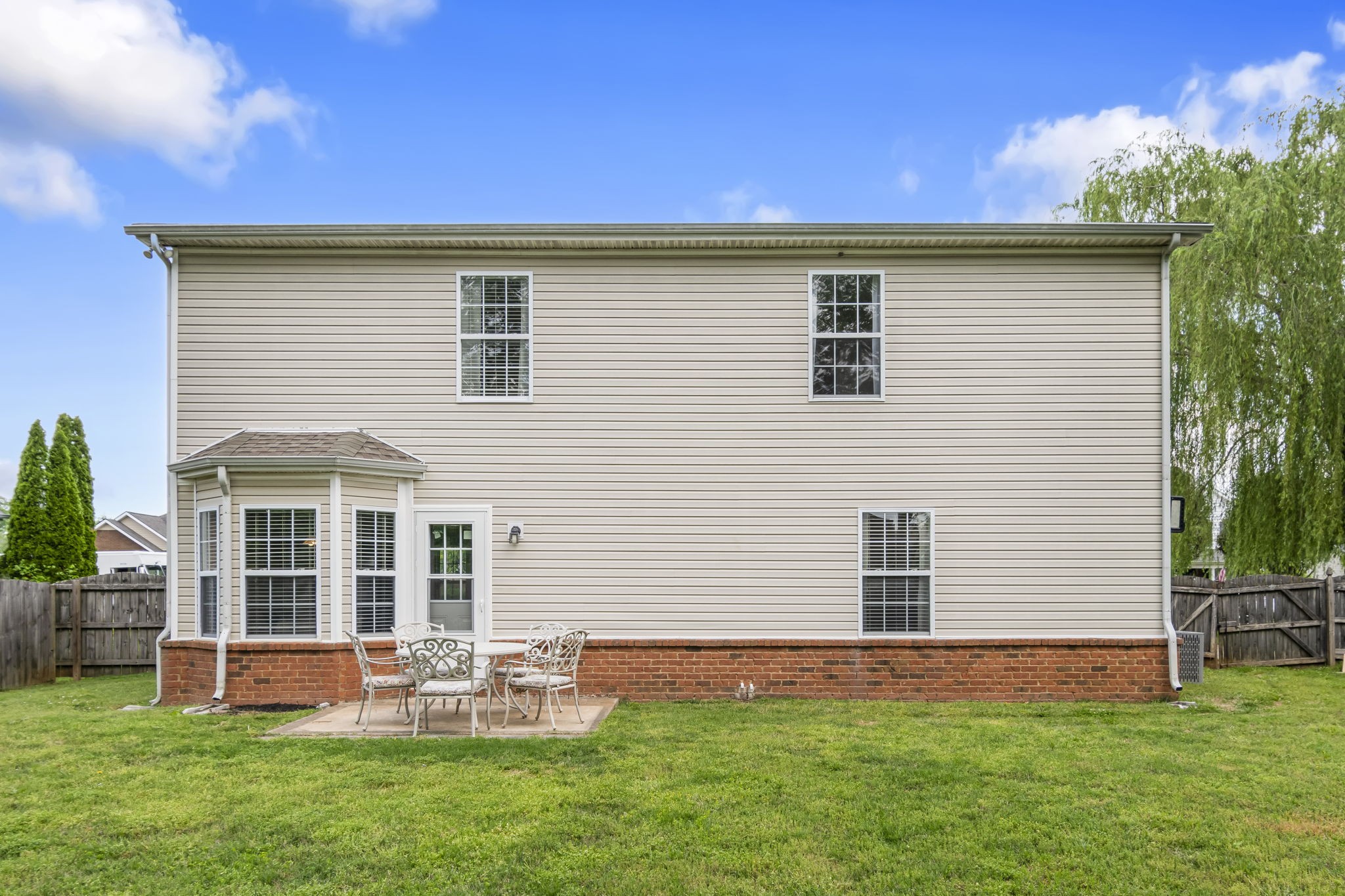 3317 Cornerstone Drive Murfreesboro, TN 37128 - Photo 33 of 33 a backyard of a house with table and chairs
