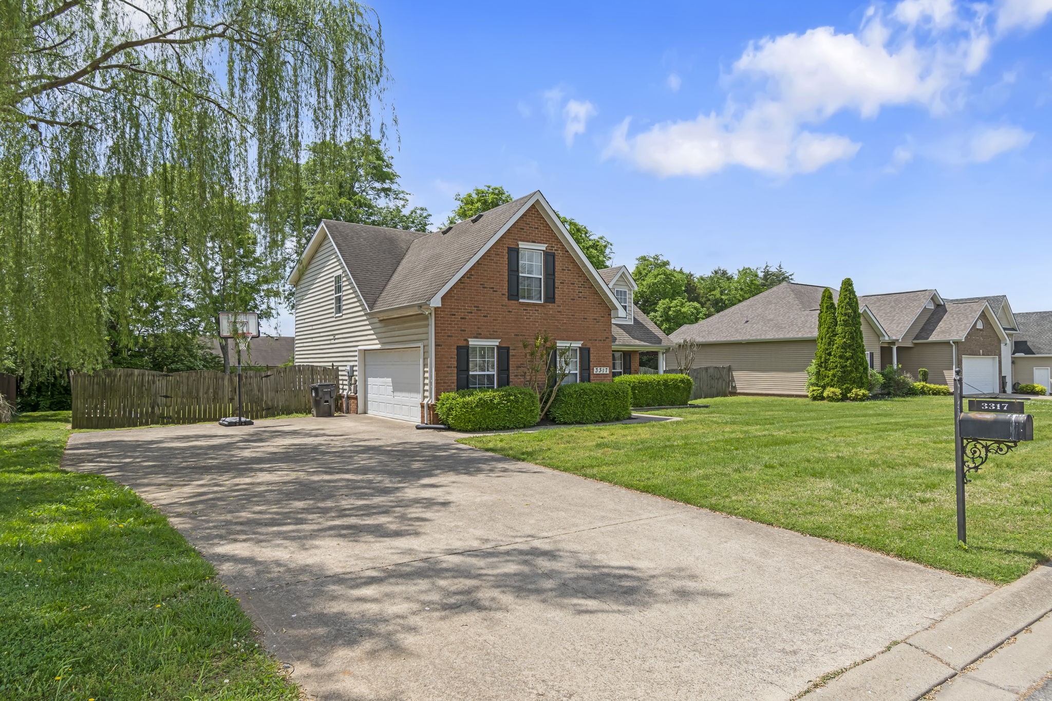 3317 Cornerstone Drive Murfreesboro, TN 37128 - Photo 4 of 33 a front view of a house with a yard