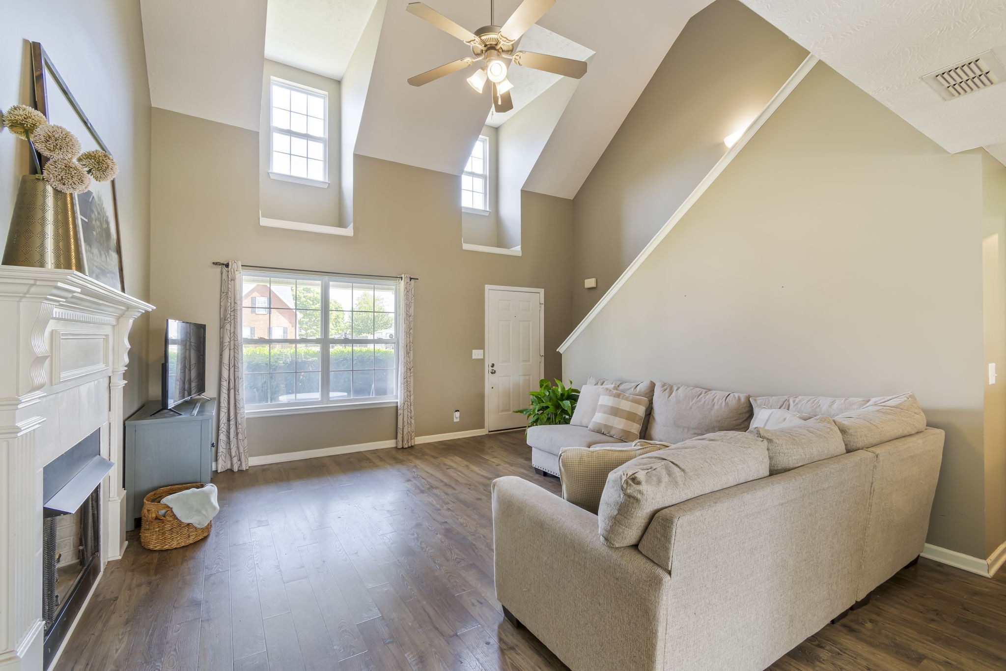 3317 Cornerstone Drive Murfreesboro, TN 37128 - Photo 7 of 33 a living room with furniture and a fireplace