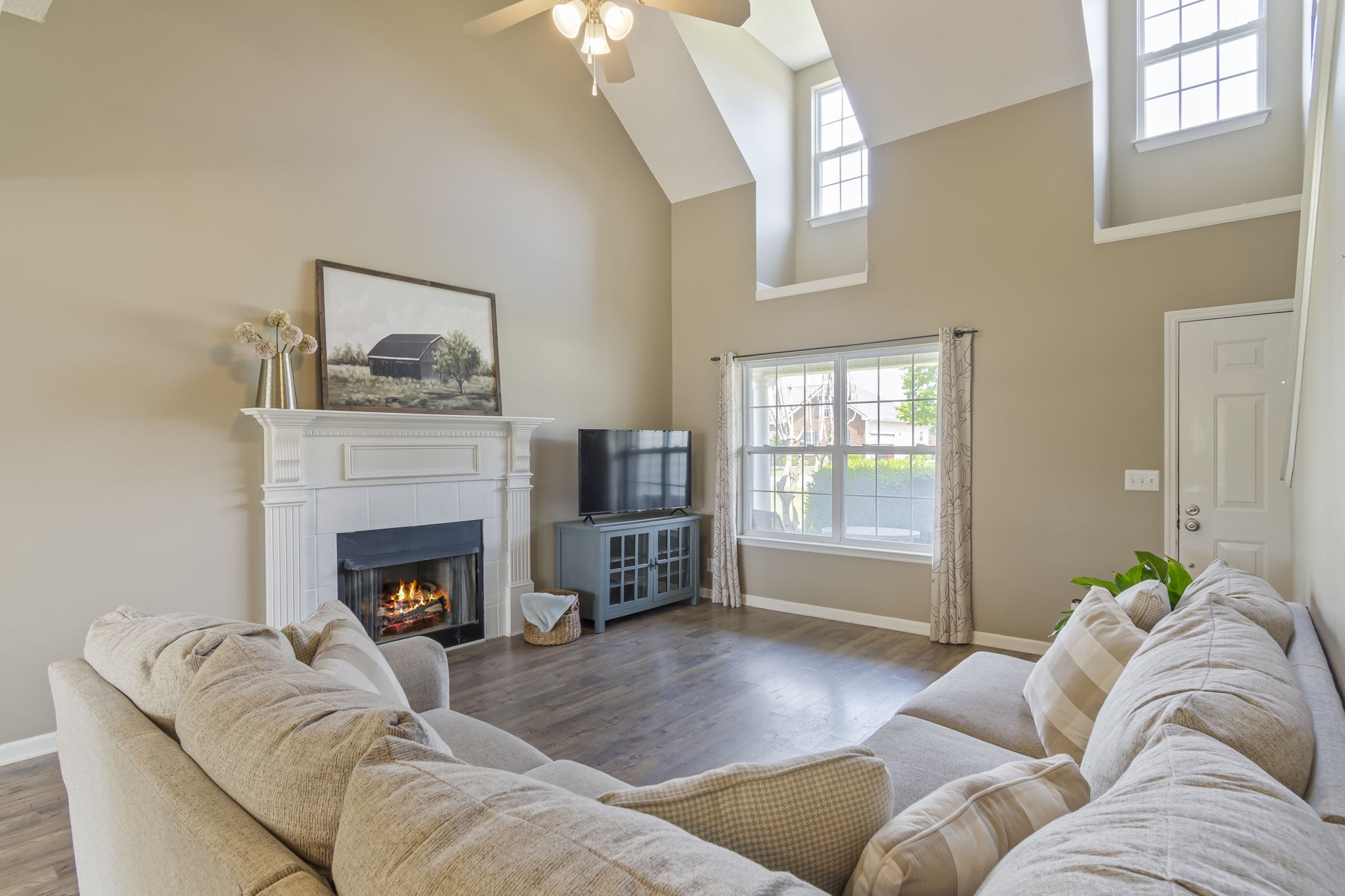 3317 Cornerstone Drive Murfreesboro, TN 37128 - Photo 8 of 33 a living room with furniture and a fireplace