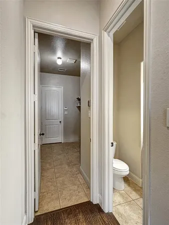 a view of a bathroom with a toilet