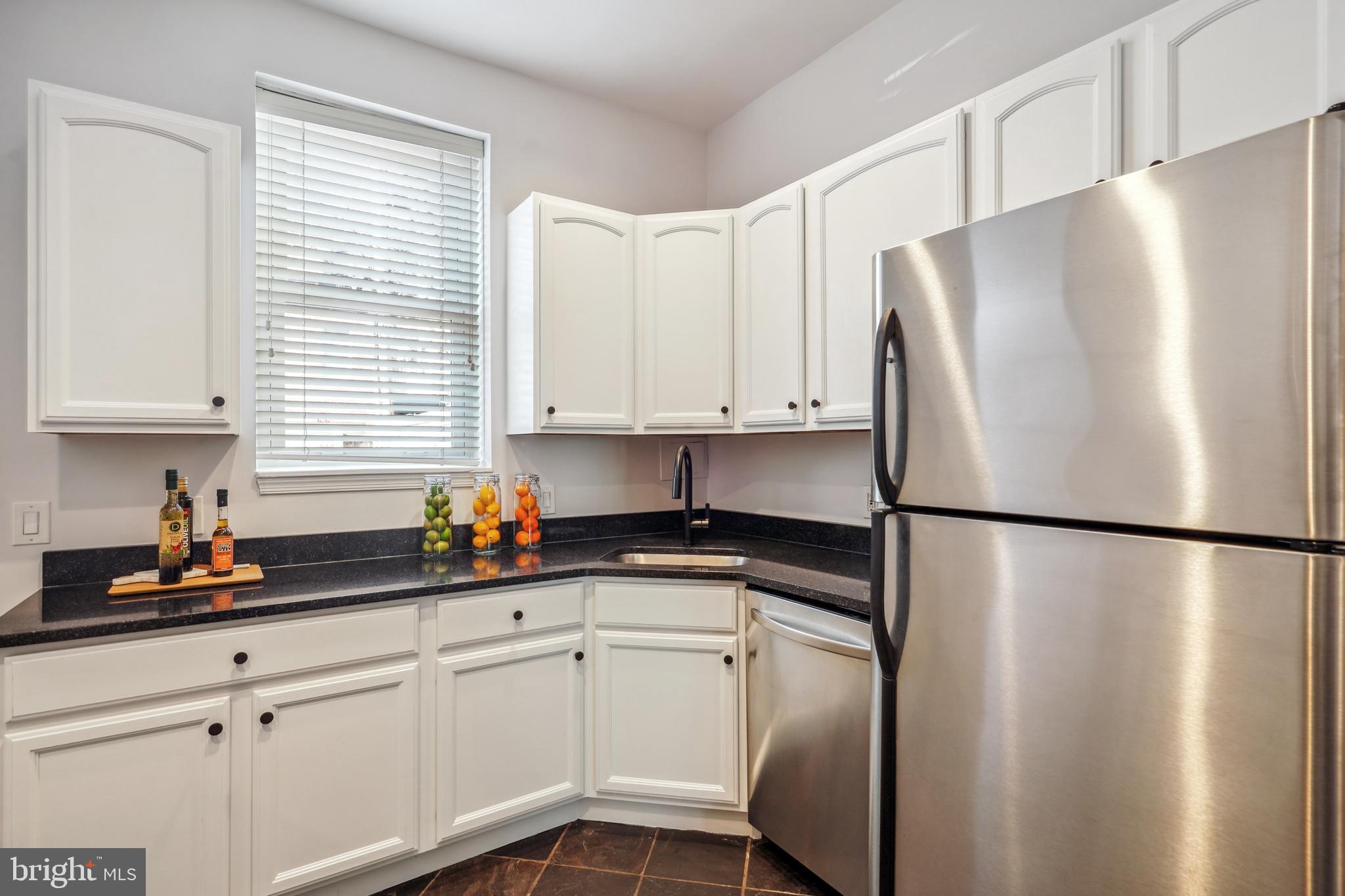 730 4th Street Northeast Washington, DC 20002 - Photo 11 of 25 Granite countertops, & stainless steel appliances