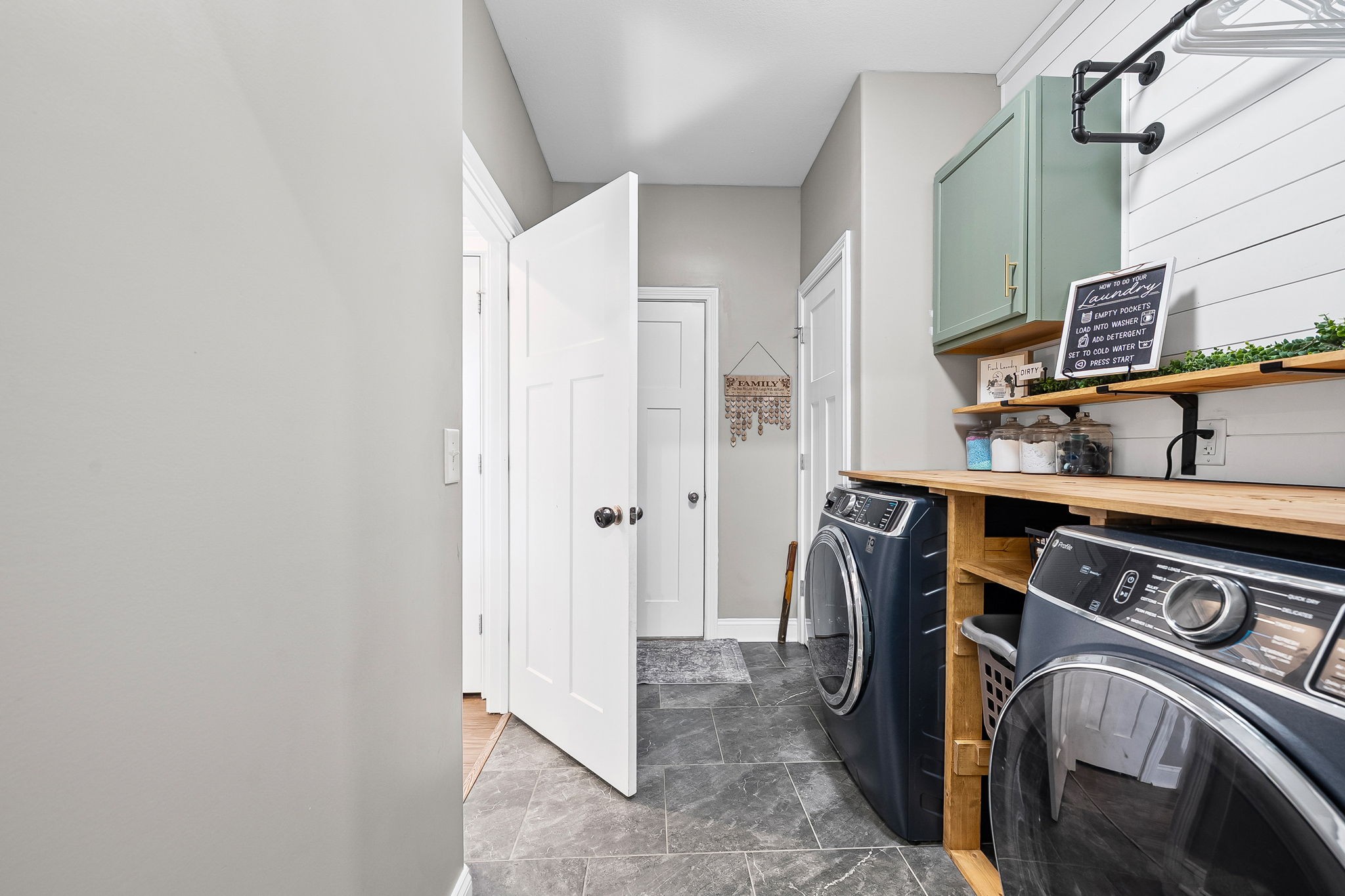 2810 Jim Taylor Road Woodlawn, TN 37191 - Photo 21 of 61 a view of walk in closet with clothes and shoes