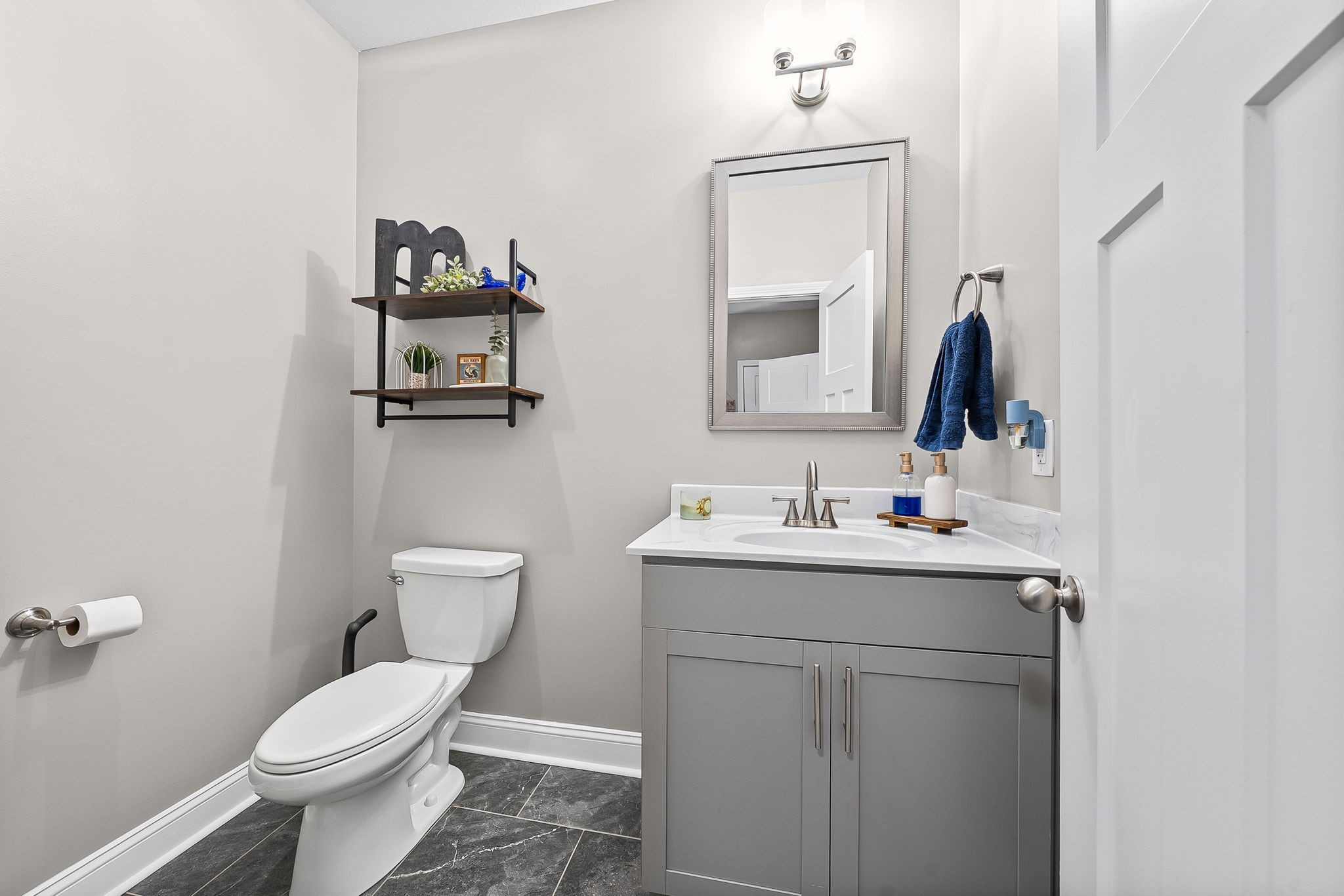 2810 Jim Taylor Road Woodlawn, TN 37191 - Photo 23 of 61 a bathroom with a toilet sink and mirror