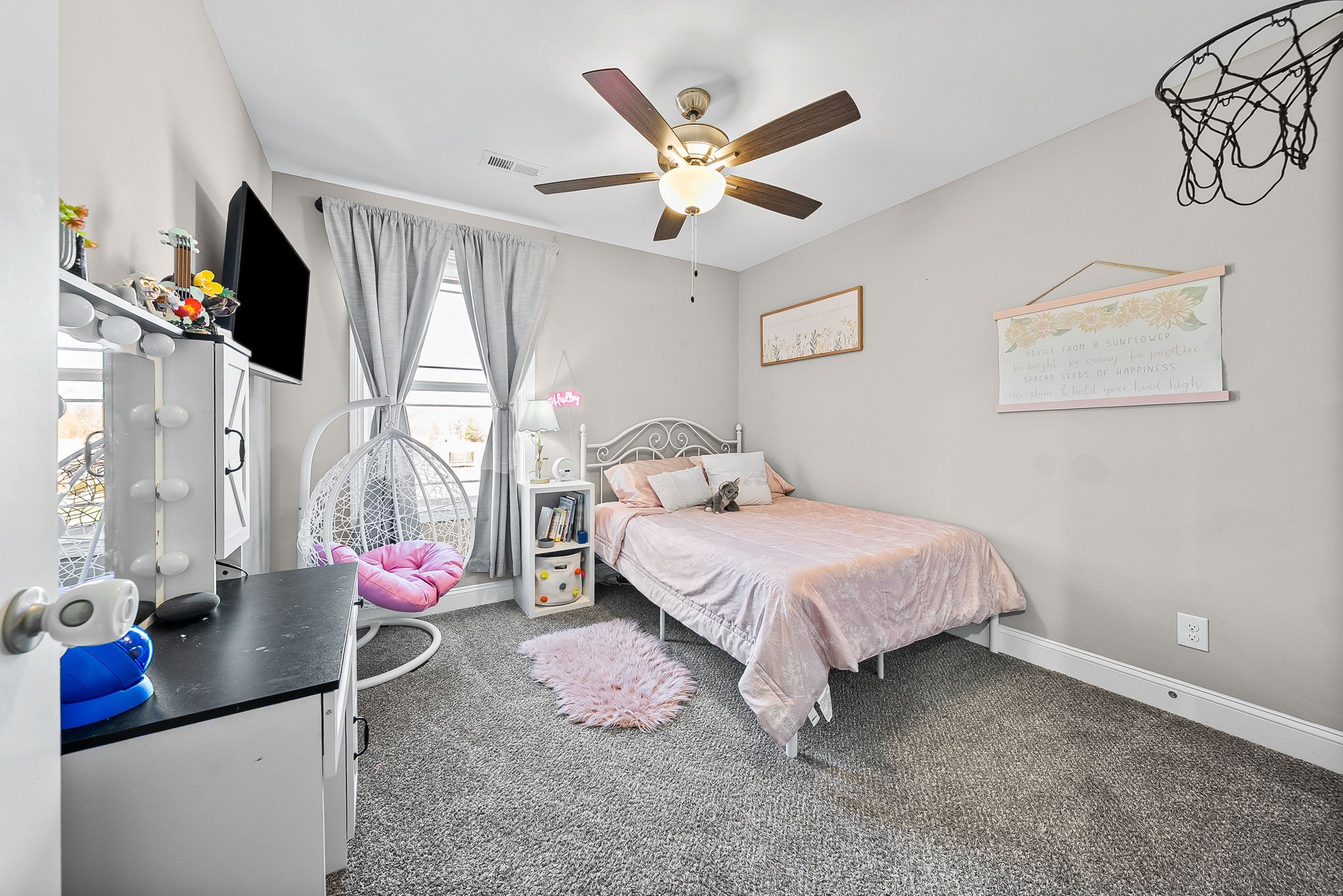 2810 Jim Taylor Road Woodlawn, TN 37191 - Photo 38 of 61 a bedroom with a bed and a flat tv screen