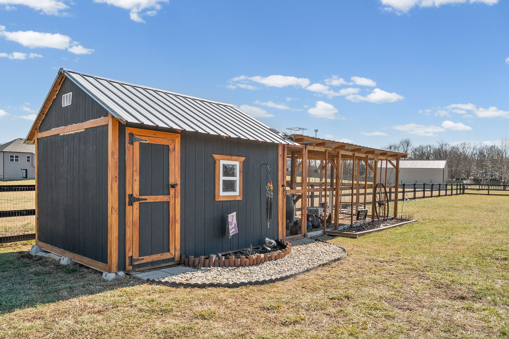 2810 Jim Taylor Road Woodlawn, TN 37191 - Photo 51 of 61 a front view of a house with a yard