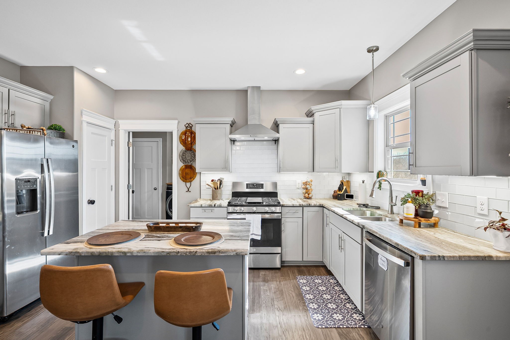 2810 Jim Taylor Road Woodlawn, TN 37191 - Photo 8 of 61 a kitchen with stainless steel appliances granite countertop a sink stove and refrigerator