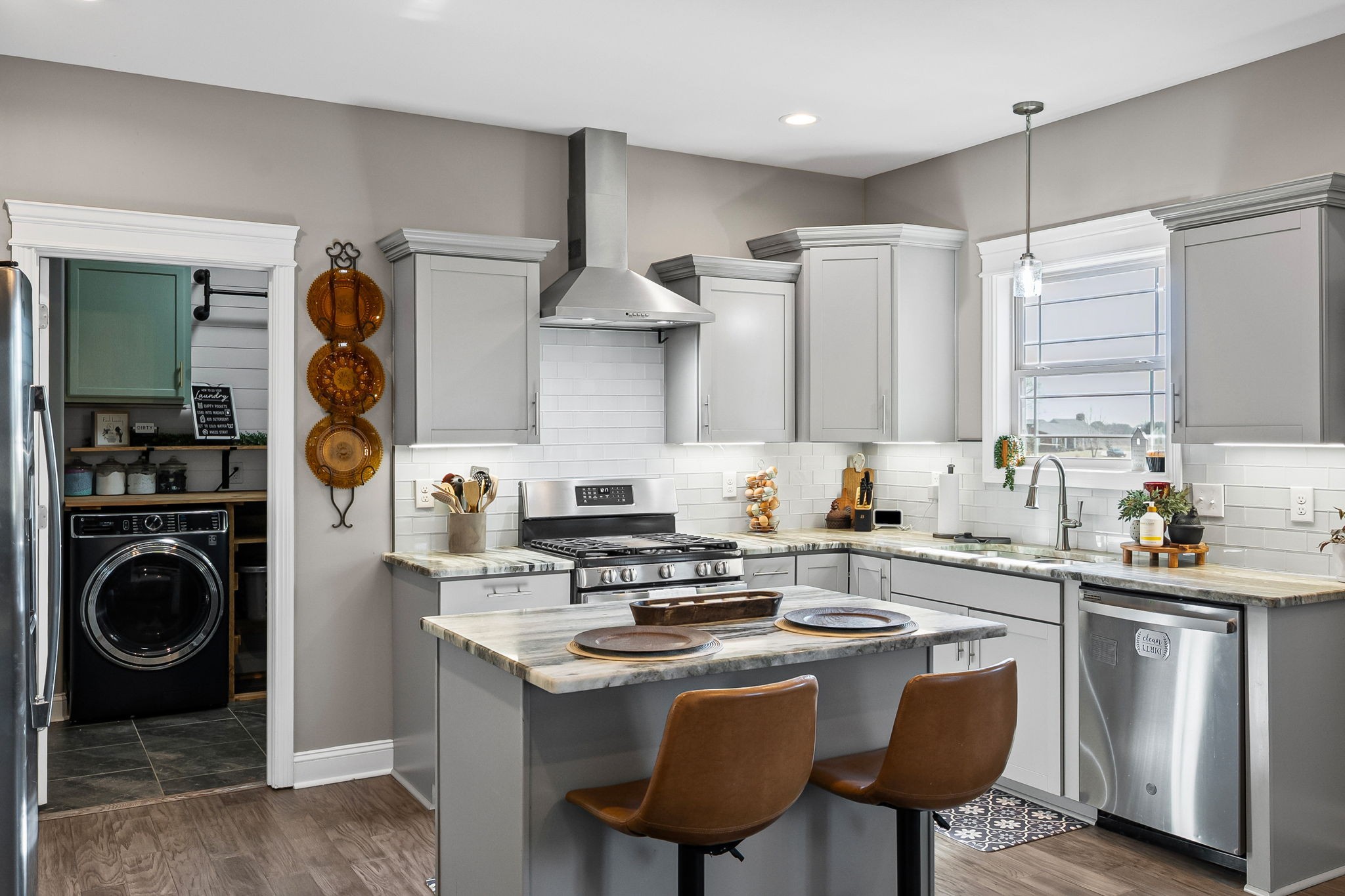 2810 Jim Taylor Road Woodlawn, TN 37191 - Photo 9 of 61 a kitchen with stainless steel appliances granite countertop a sink a stove and cabinets