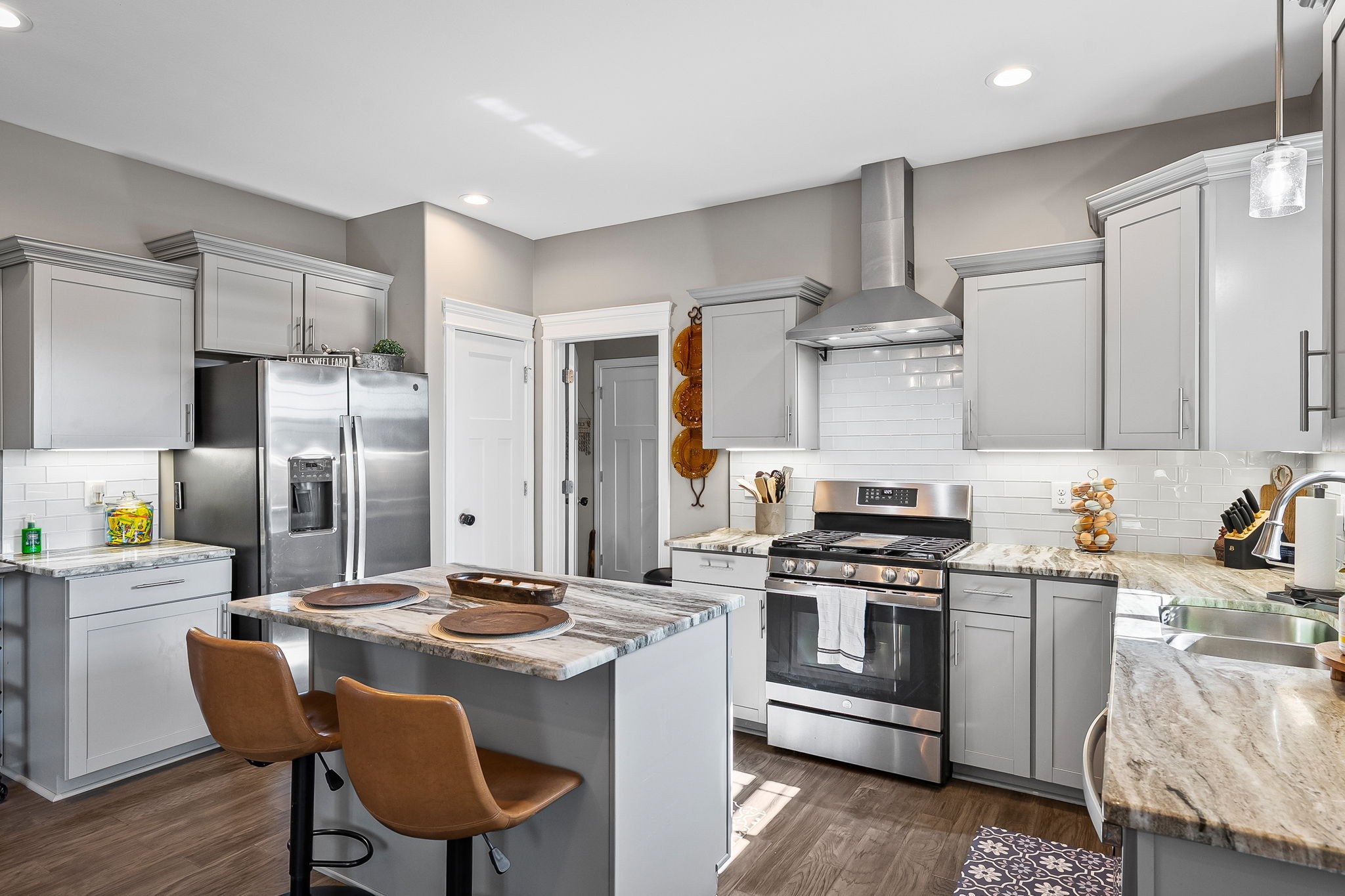 2810 Jim Taylor Road Woodlawn, TN 37191 - Photo 10 of 61 a kitchen with stainless steel appliances granite countertop a sink stove and refrigerator