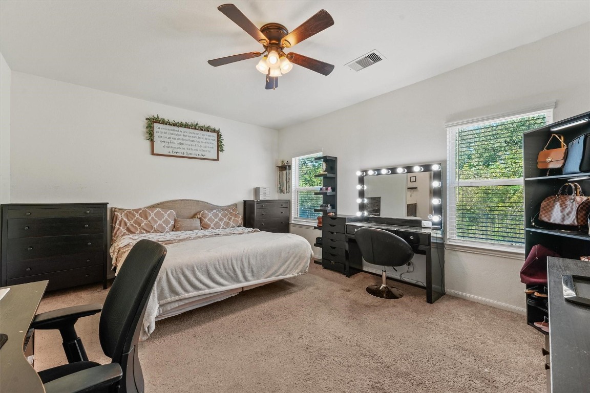 5303 Rivers Edge Drive Richmond, TX 77469 - Photo 18 of 26 a bedroom with a bed and a window
