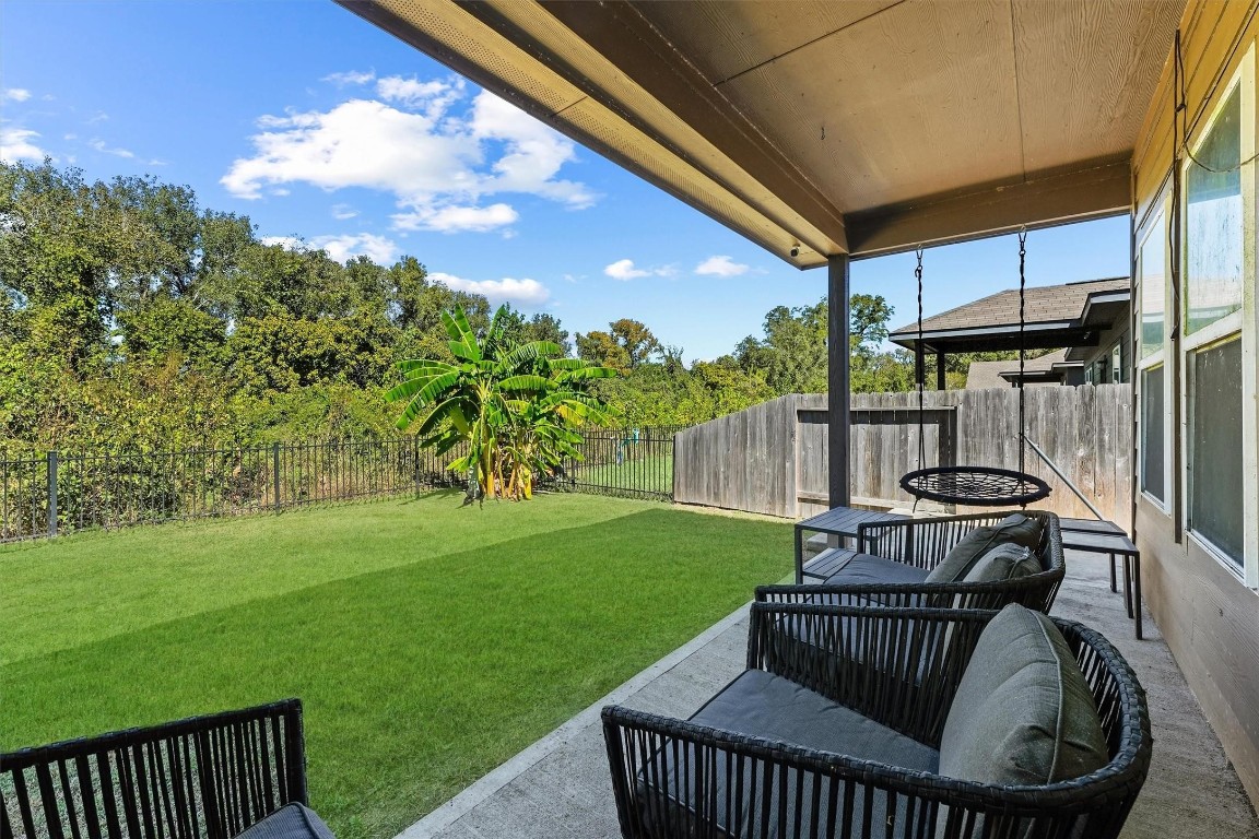 5303 Rivers Edge Drive Richmond, TX 77469 - Photo 23 of 26 a patio with table and chairs and potted plants