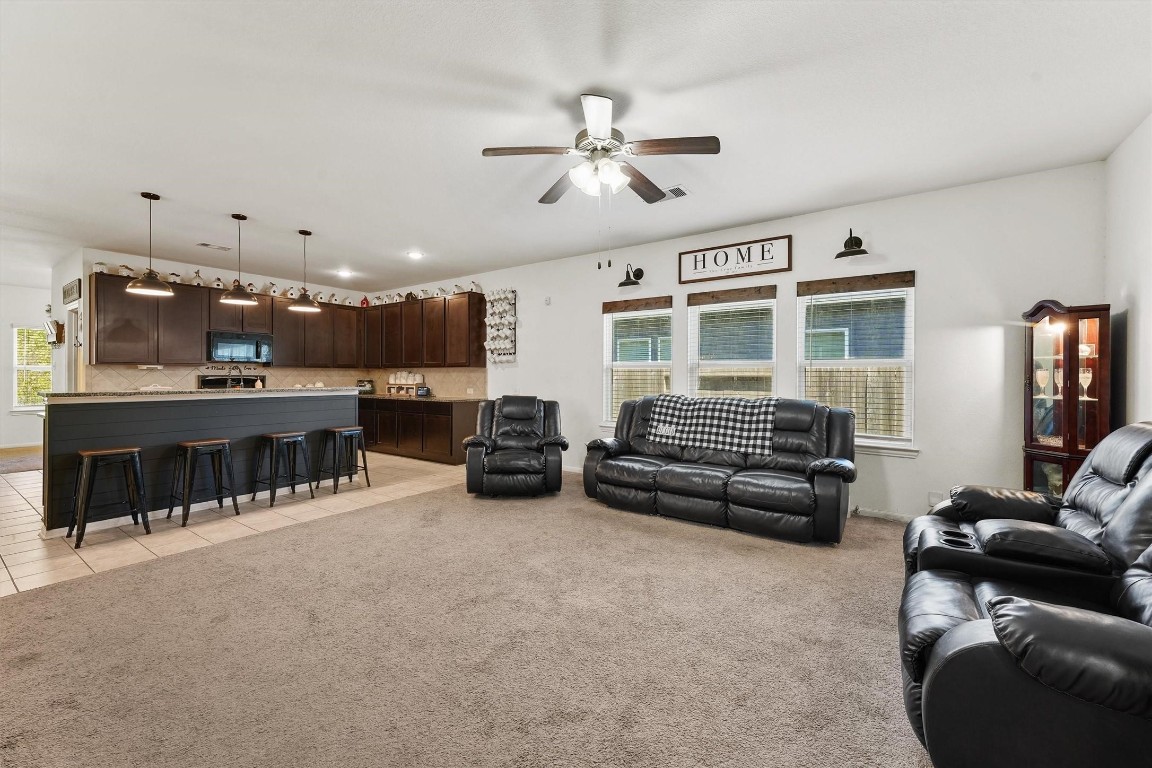 5303 Rivers Edge Drive Richmond, TX 77469 - Photo 5 of 26 a living room with furniture and a window