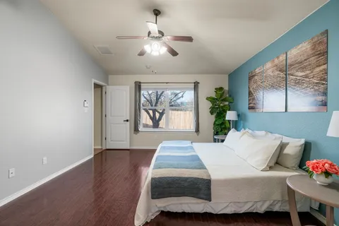 swimming pool view with a seating space