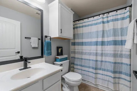 a front view of house with garage and yard