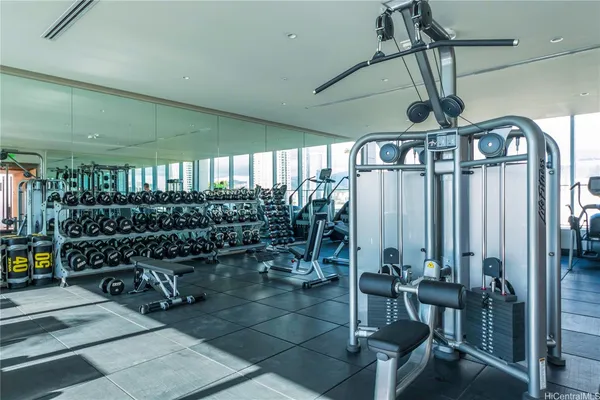 a room with lots of gym equipment