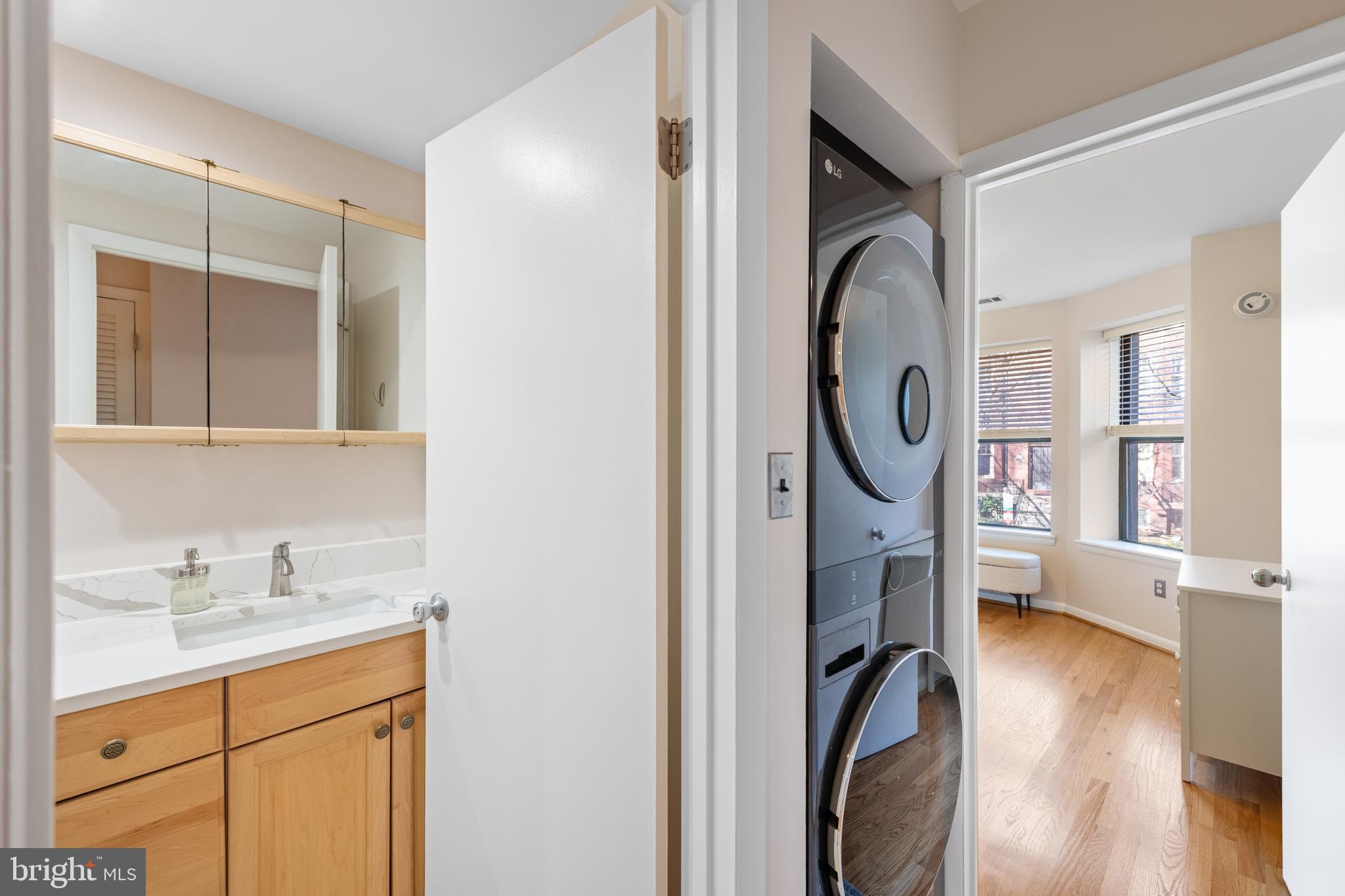 2012 O Street Northwest, Unit 22 Washington, DC 20036 - Photo 11 of 21 a utility room with dryer and washer