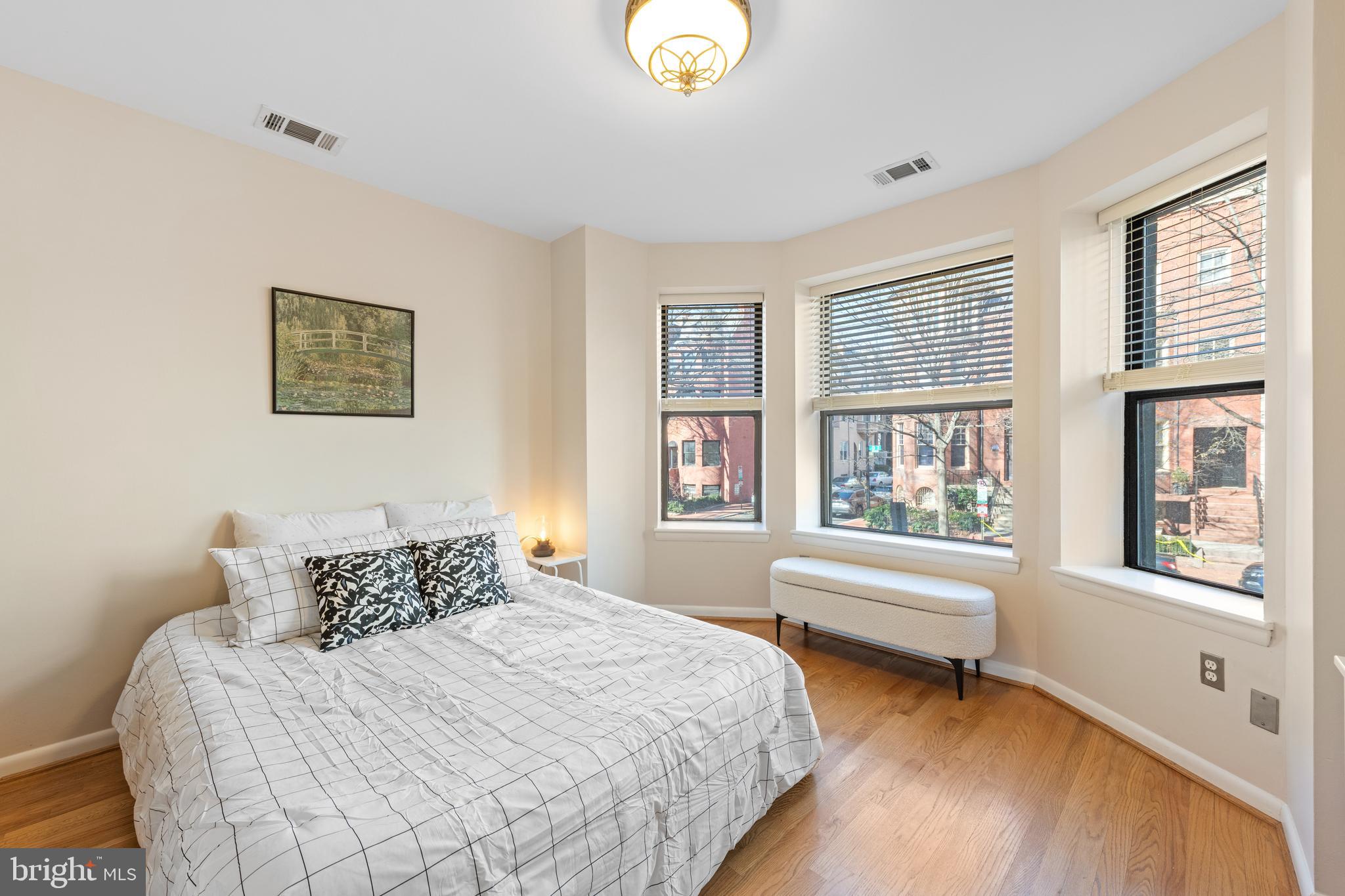 2012 O Street Northwest, Unit 22 Washington, DC 20036 - Photo 15 of 21 a bedroom with bed and window