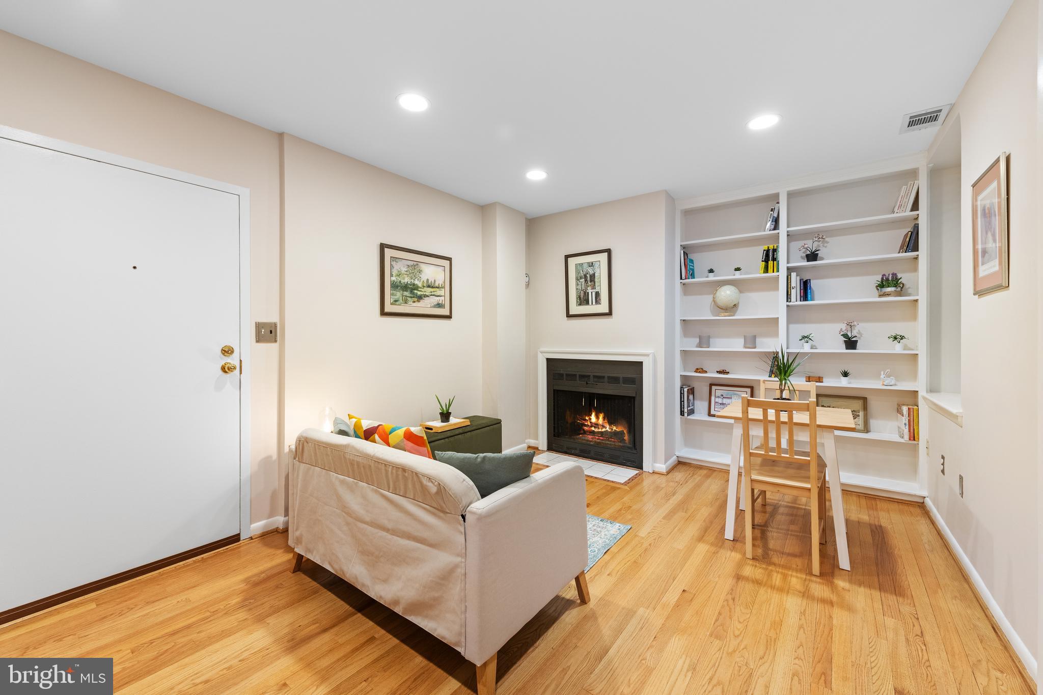 2012 O Street Northwest, Unit 22 Washington, DC 20036 - Photo 7 of 21 a living room with furniture and a fireplace
