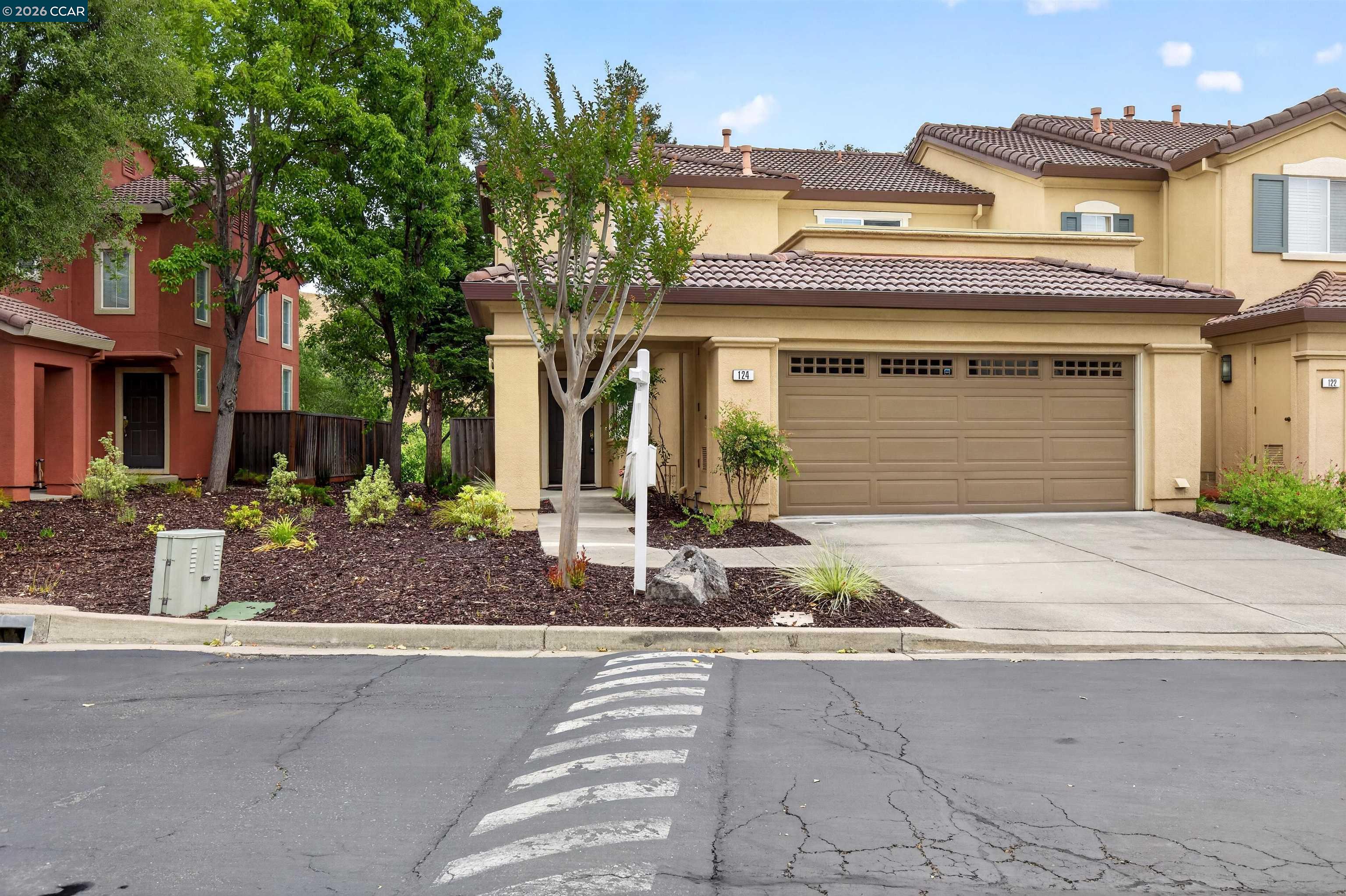 124 Coralflower Lane San Ramon, CA 94582 - Photo 2 of 47 a front view of a house with garden