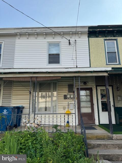 133 Maffitt Street Elkton, MD 21921 - Photo 1 of 8 a view of a white house with large windows
